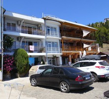Эллинг общ.пл. 260 м.кв. в Рыбачьем 27 км. от Алушты, первая линия, действующий бизнес, парковка - Продам в Рыбачьем